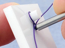 Wire being wrapped around a jig